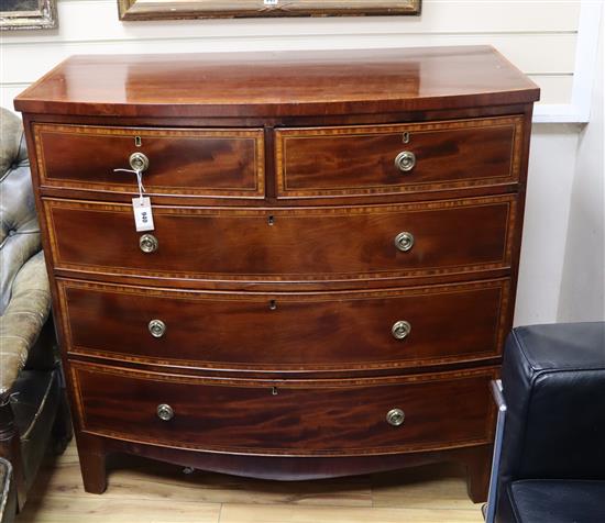 A late Regency mahogany crossbanded and inlaid bowfront chest of drawers W.102cm